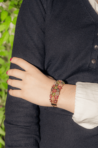 Bracelet Bracelet manchette en or jaune 18 carats avec diamants et pierres 58 Facettes 3023392CN