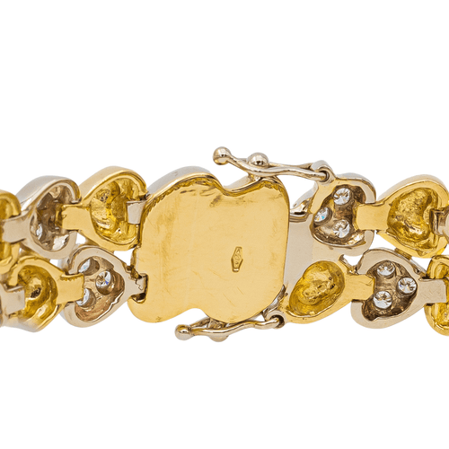 Bracelet Bracelet motifs cœur en or jaune et or blanc 18 carats et diamants 58 Facettes 3036216CN