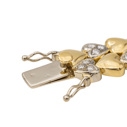 Bracelet Bracelet motifs cœur en or jaune et or blanc 18 carats et diamants 58 Facettes 3036216CN