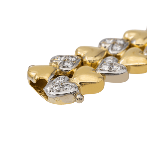 Bracelet Bracelet motifs cœur en or jaune et or blanc 18 carats et diamants 58 Facettes 3036216CN