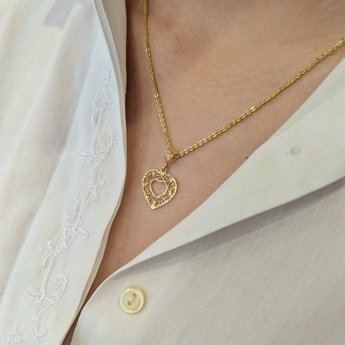 Pendentif Pendentif cœur en filigrane en or jaune 18 carats 58 Facettes 32176