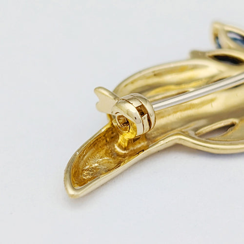 Broche Broche en or jaune 18 carats avec saphirs et diamant 58 Facettes 32262