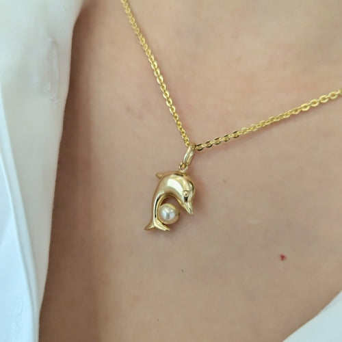 Pendentif Pendentif dauphin en or jaune 18 carats et perle de culture 58 Facettes 32268