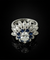 Bague Bague fleur étoilée années 1960 avec diamant, saphirs et diamants 58 Facettes