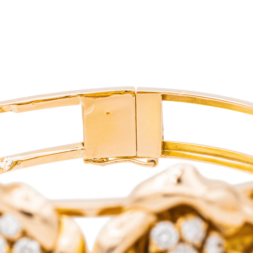 Bracelet Bracelet manchette en or jaune 18 carats serti de diamants 58 Facettes 3334092CN