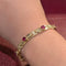 Bracelet Bracelet en or jaune 18 carats avec rubis et diamants 58 Facettes 33380