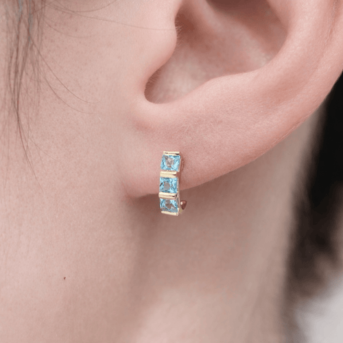 Boucles d'oreilles Boucles d’oreilles demi-lune en or jaune 18 carats et aigues-marines 58 Facettes 33685