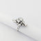 Bague 48 Bague bouquet en or blanc 18 carats et diamants 58 Facettes 33708