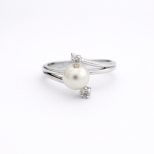 Bague 47 Bague perle et diamants en or blanc 18 carats 58 Facettes 34427