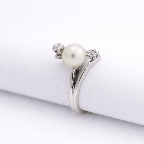 Bague 47 Bague perle et diamants en or blanc 18 carats 58 Facettes 34427