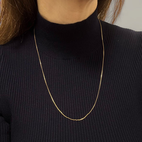 Collier Chaîne fine en maille plate en or jaune 18k 58 Facettes REF2564-332