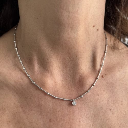 Collier Collier point de lumière en or blanc 18 ct avec diamant 0,10 ct 58 Facettes 36152