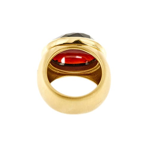 https://api-ledial.emberware.it/app/uploads/2025/04/36427-anello-oro-granato-pomellato-iceberg-8.jpg