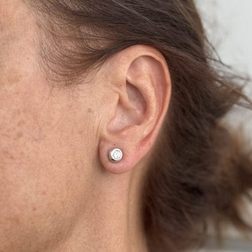 Boucles d'oreilles Boucles d’oreilles point de lumière en or blanc 18 kt et diamants 0,40 ct 58 Facettes 36841