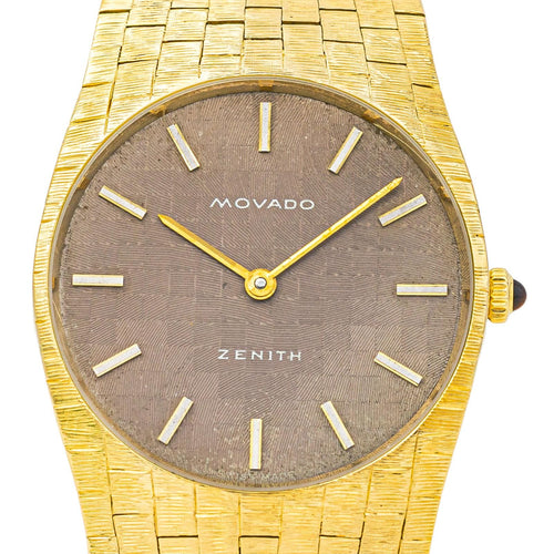 Montre Zenith/Movado - Montre en or jaune 18 carats œil de tigre 58 Facettes 3810565CN