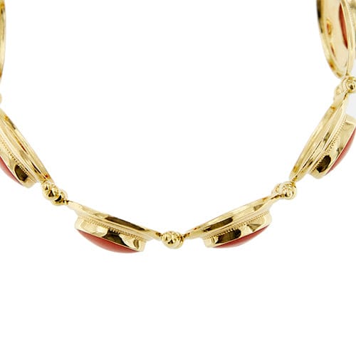 Bracelet Bracelet à maillons ovales en or jaune 18 carats et corail rouge 58 Facettes 39982