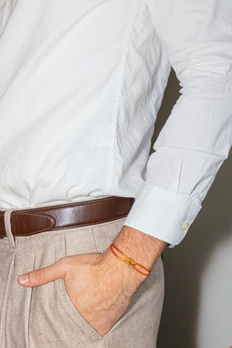 Bracelet Dinh Van - Bracelet cordon Pi en or jaune 58 Facettes 4501011CN