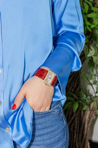 Montre Cartier Tank Divan - Montre en or jaune sertie de diamants 58 Facettes 4551671RV