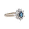 Bague 59 Bague marguerite en or blanc avec saphir et diamants 58 Facettes 4878498CN