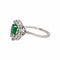 Bague 50 Bague marguerite en or blanc 18 carats, émeraude et diamants 58 Facettes 4941667CN