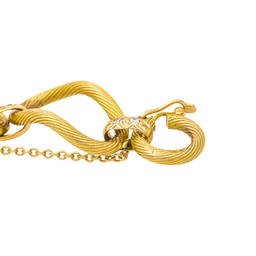 Bracelet Bracelet vintage en or jaune et or rose 18 carats avec diamants 58 Facettes 578078CD