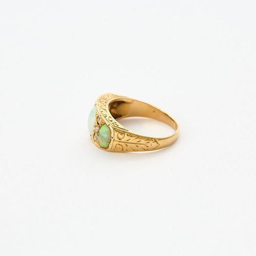 Bague 55 Elégante Bague Jarretière Or Jaune, Opale et Diamants 58 Facettes QUI05382