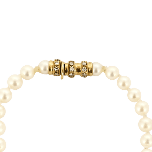 Collier Collier de perles de culture en or jaune et diamants, saphirs 58 Facettes BO/250007