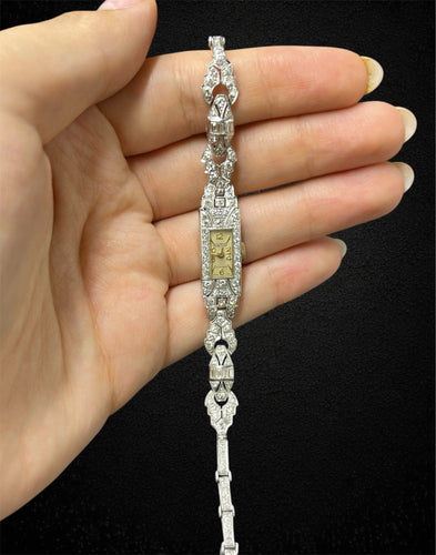 Montre Montre Art déco en or blanc 18 carats et diamants 58 Facettes
