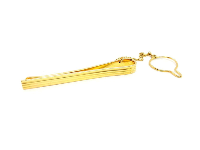 Broche Hermès - Pince à cravate en or jaune 18 carats 58 Facettes 720124CN