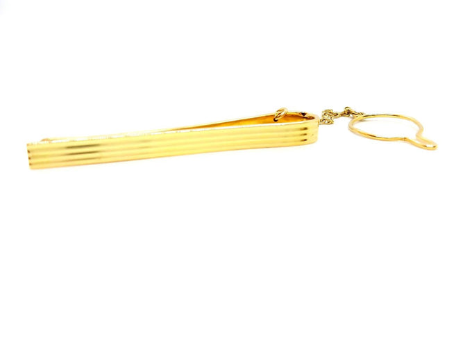 Broche Hermès - Pince à cravate en or jaune 18 carats 58 Facettes 720124CN