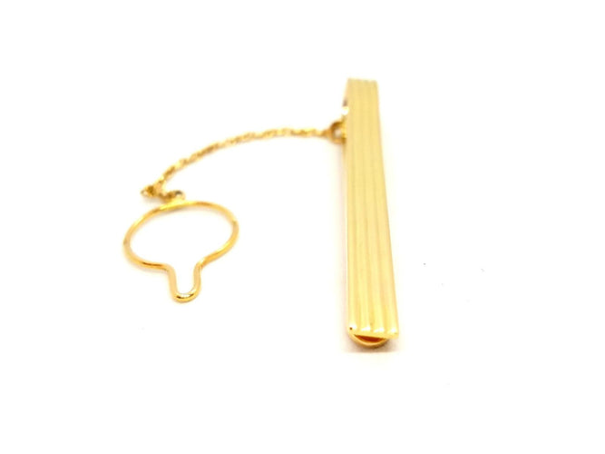 Broche Hermès - Pince à cravate en or jaune 18 carats 58 Facettes 720124CN
