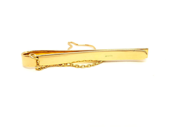 Broche Hermès - Pince à cravate en or jaune 18 carats 58 Facettes 720124CN