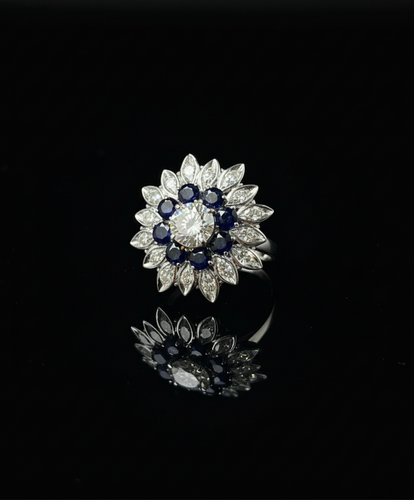 Bague Bague fleur étoilée années 1960 avec diamant, saphirs et diamants 58 Facettes