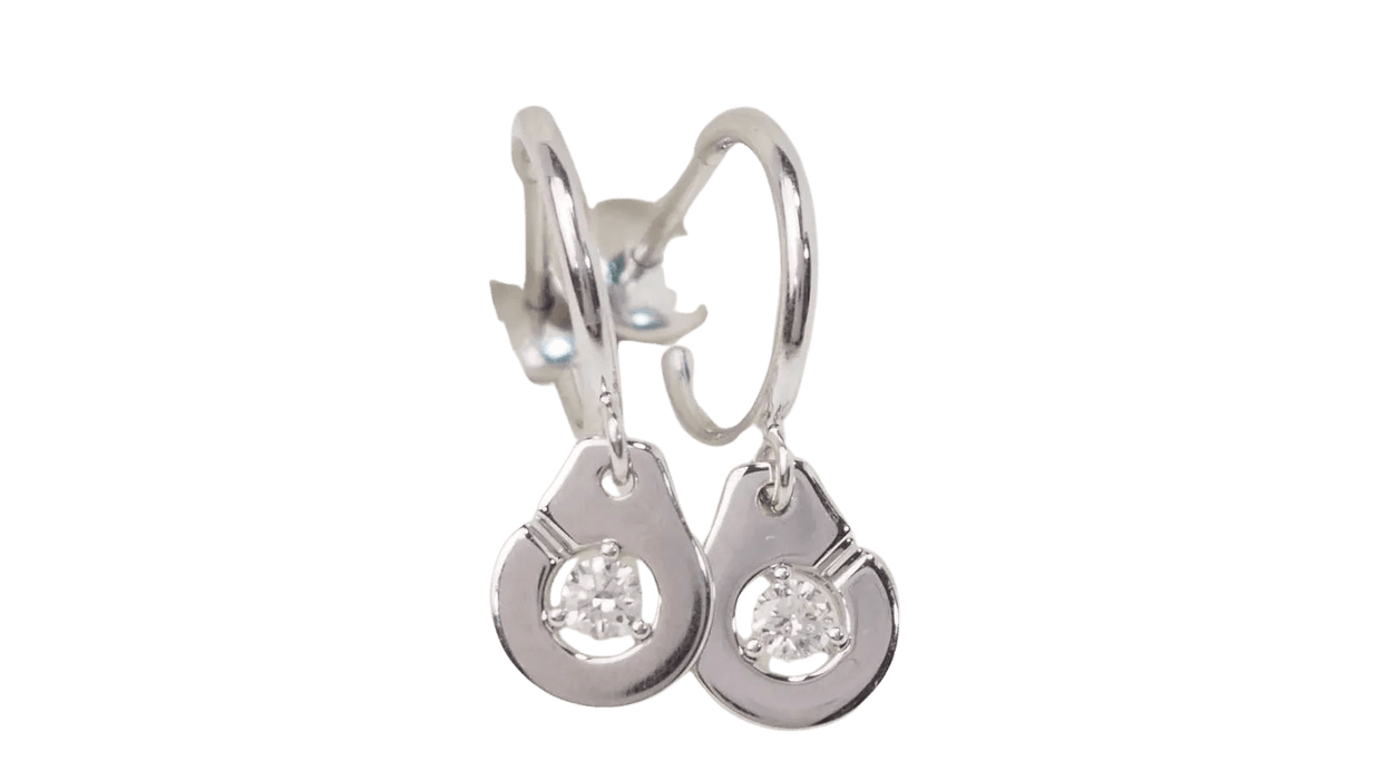 DINH VAN - Boucles d'oreilles menottes en or blanc et diamants