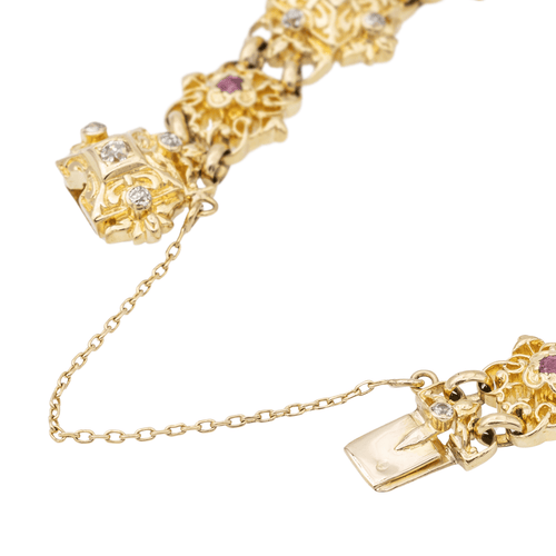 Bracelet Bracelet en or jaune 18 carats serti de diamants et rubis 58 Facettes 836609CN