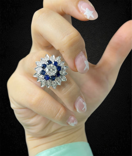 Bague Bague fleur étoilée années 1960 avec diamant, saphirs et diamants 58 Facettes