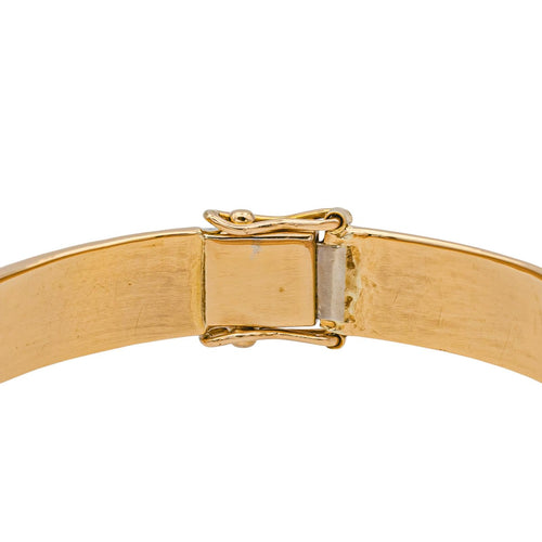 Bracelet Bracelet jonc rigide ovale en or jaune 18 carats 58 Facettes 978815CD