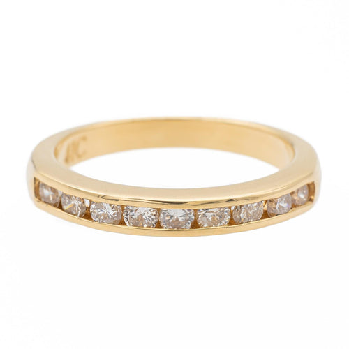 Bague 50 Bague demi-alliance en or jaune avec diamants 58 Facettes 990258CN