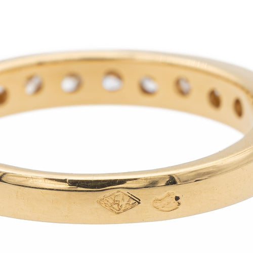 Bague 50 Bague demi-alliance en or jaune avec diamants 58 Facettes 990258CN