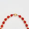 Collier Collier or jaune billes de corail 58 Facettes DV0362-3