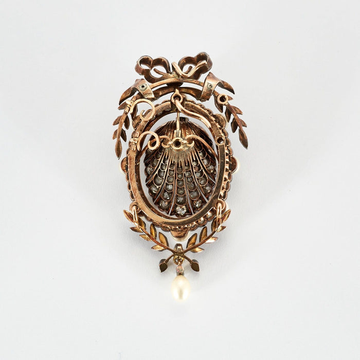 Broche Broche à motif floral et nœud ornée de perles et diamants 58 Facettes DV0602-2