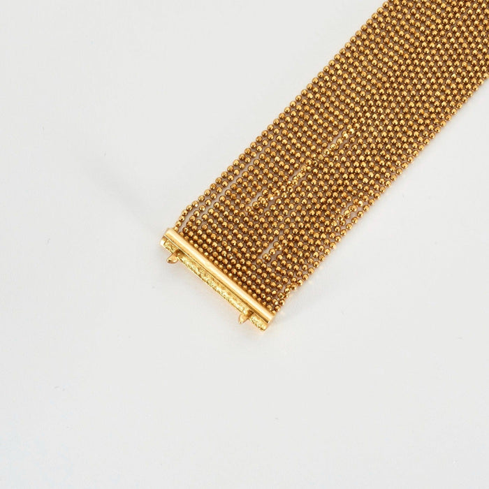 Bracelet Bracelet souple avec nombreuses chainettes en or jaune perlé 58 Facettes DV0624-17