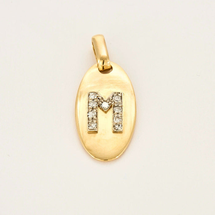 Pendentif 3.9 x 1.9 Pendentif "M" ovale or jaune 18K et diamants 58 Facettes DV0710-2-3-4