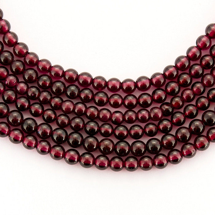 Collier Collier or jaune et perles grenats 58 Facettes DV0184-19