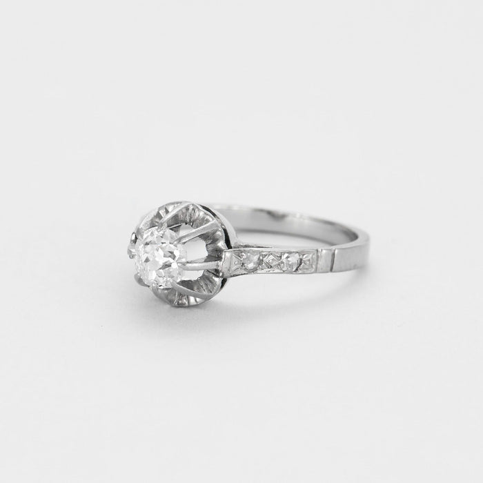 Bague solitaire platine, or gris et diamants