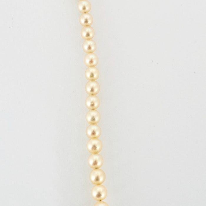 Collier Collier en or jaune et perles blanches 58 Facettes DV0778-1