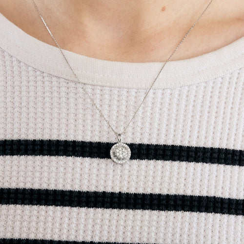 Pendentif Pendentif circulaire en or blanc et diamants 58 Facettes DV5707-12