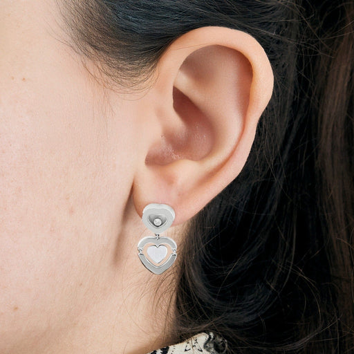 Boucles d'oreilles CHOPARD - Happy Amor - Boucles d'oreilles cœur en Or blanc et Diamant 58 Facettes DV7166-1