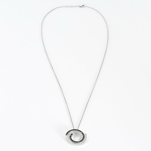 Pendentif DINH VAN - SPIRALE - Pendentif en or blanc, diamants et diamant noirs 58 Facettes DV0821-1