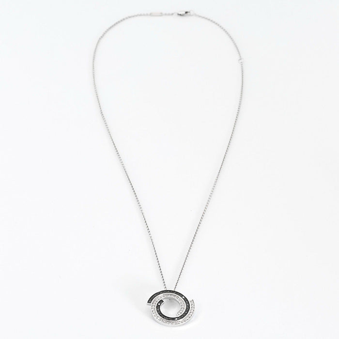 Pendentif DINH VAN - SPIRALE - Pendentif en or blanc, diamants et diamant noirs 58 Facettes DV0821-1